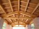Copertura in legno lamellare e mattoni in cotto